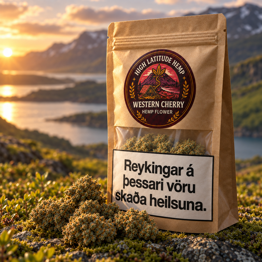 Western Cherry CBD flower in an angled kraft pouch, with hemp flower in the foreground and softly blurred Icelandic mountains at sunset.